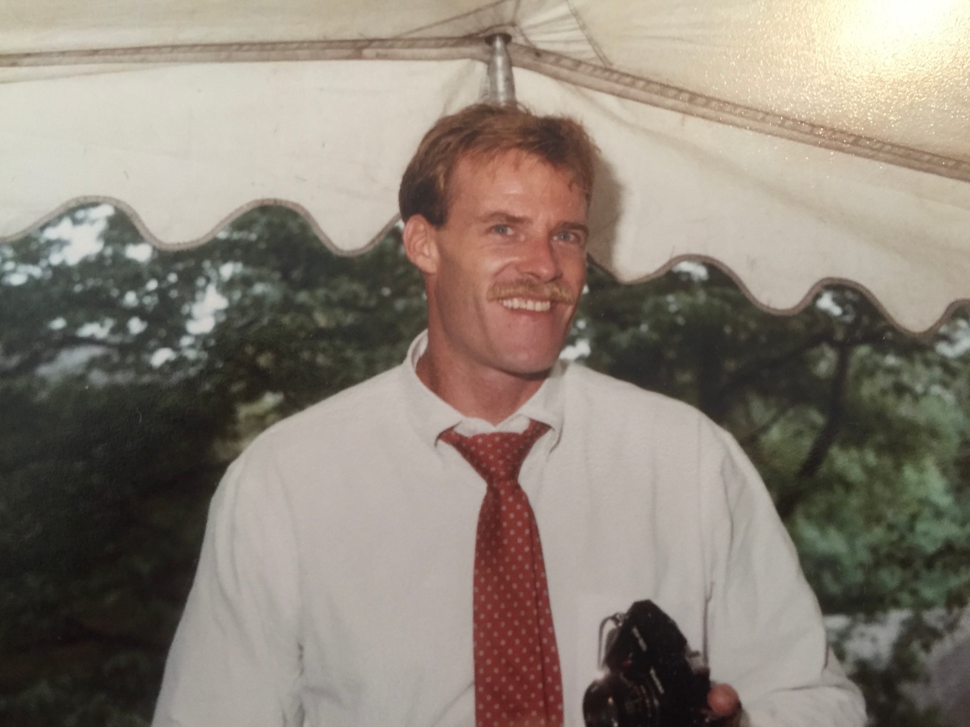 A vintage family photograph of Lauren's uncle Quaid